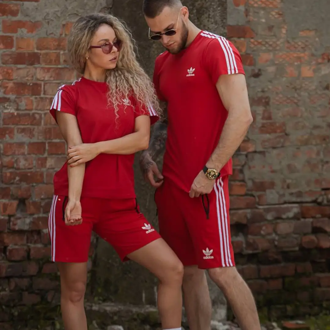 Для неї Жіночий костюм (штани + сорочка) коричневий Магазин Орхідея Шорти Adidas (червоні)