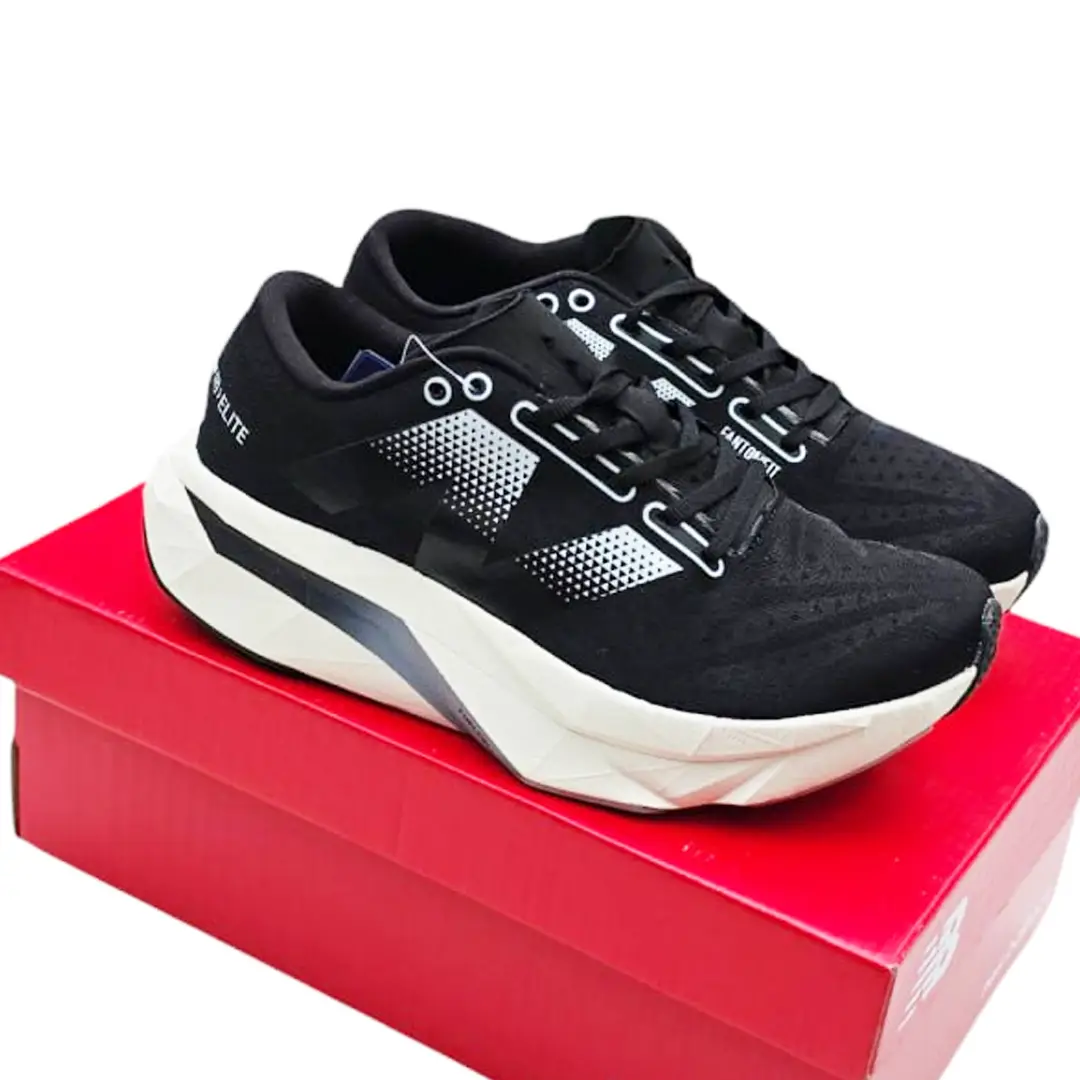Взуття Жіночі кросівки New Balance Elite V4 (рожеві/синім) Магазин Орхідея Жіночі кросівки New Balance Elite V (чорні)