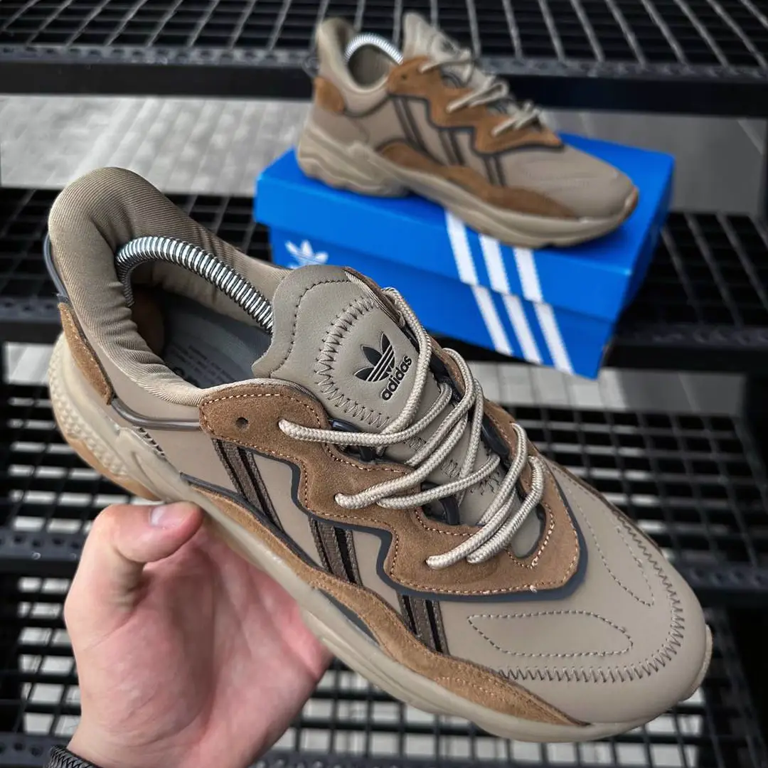 Взуття Кросівки Adidas Forum low (white & gray) Магазин Орхідея Кросівки Adidas Ozweego (brown)