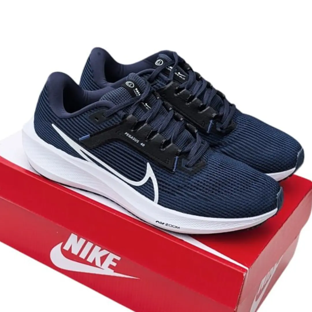 Взуття Кросівки Nike Zoom Winflo (чорні з білим) Магазин Орхідея Чоловічі кросівки Nike Pegasus (сині)